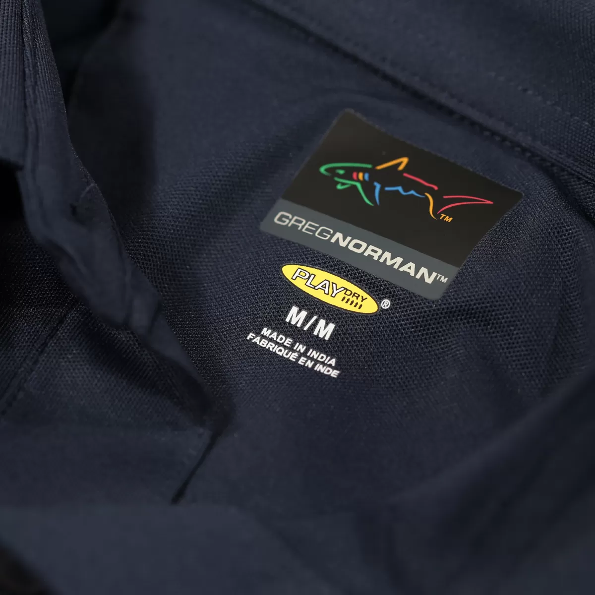 Store Greg Norman Men's Neck Logo Stretch Golf Polo Shirt